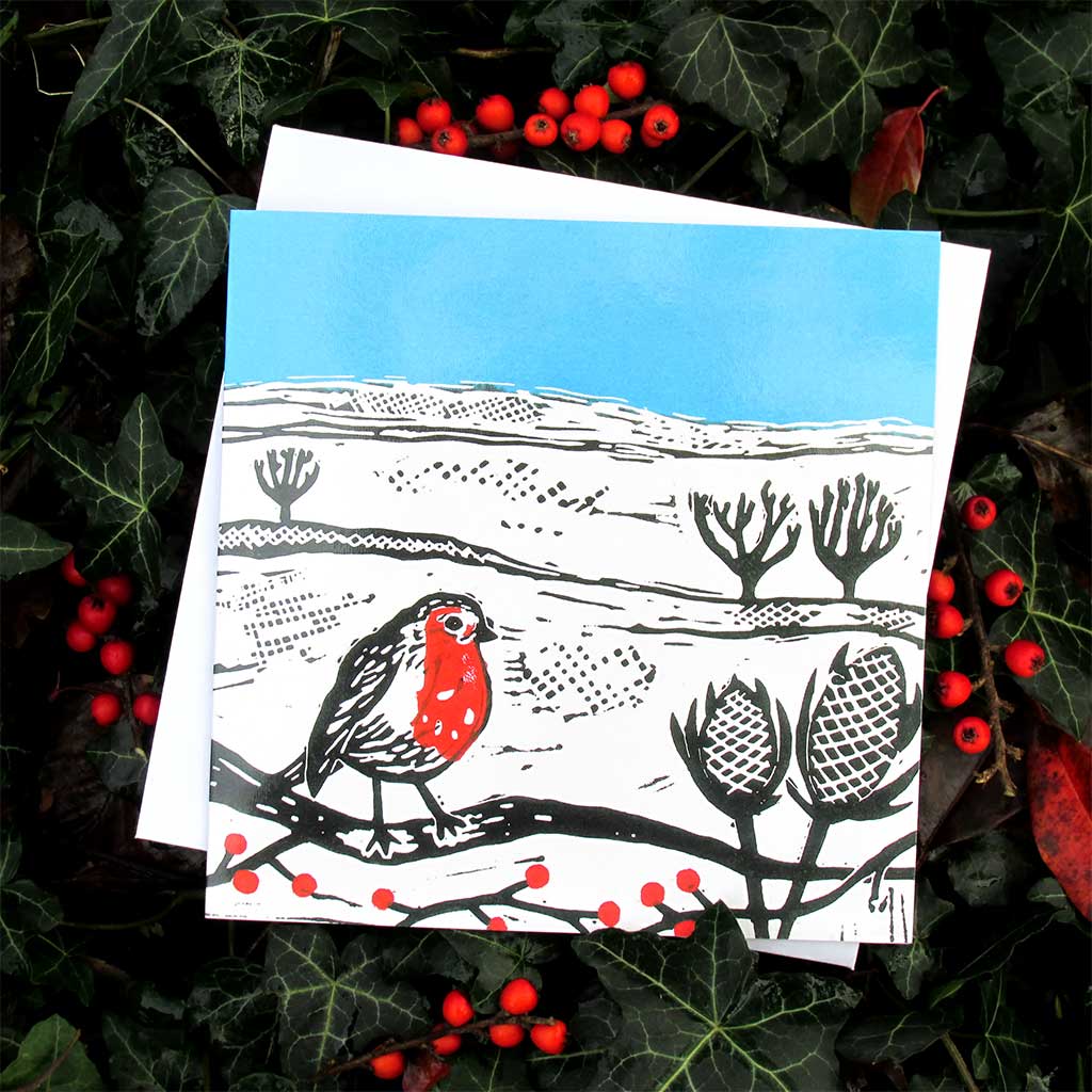 A Robin on a Berry Branch Greeting Card by Joanna Padfield for sale at the Sanders and Christie Gallery in Sheringham.