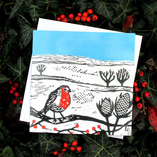 A Robin on a Berry Branch Greeting Card by Joanna Padfield for sale at the Sanders and Christie Gallery in Sheringham.