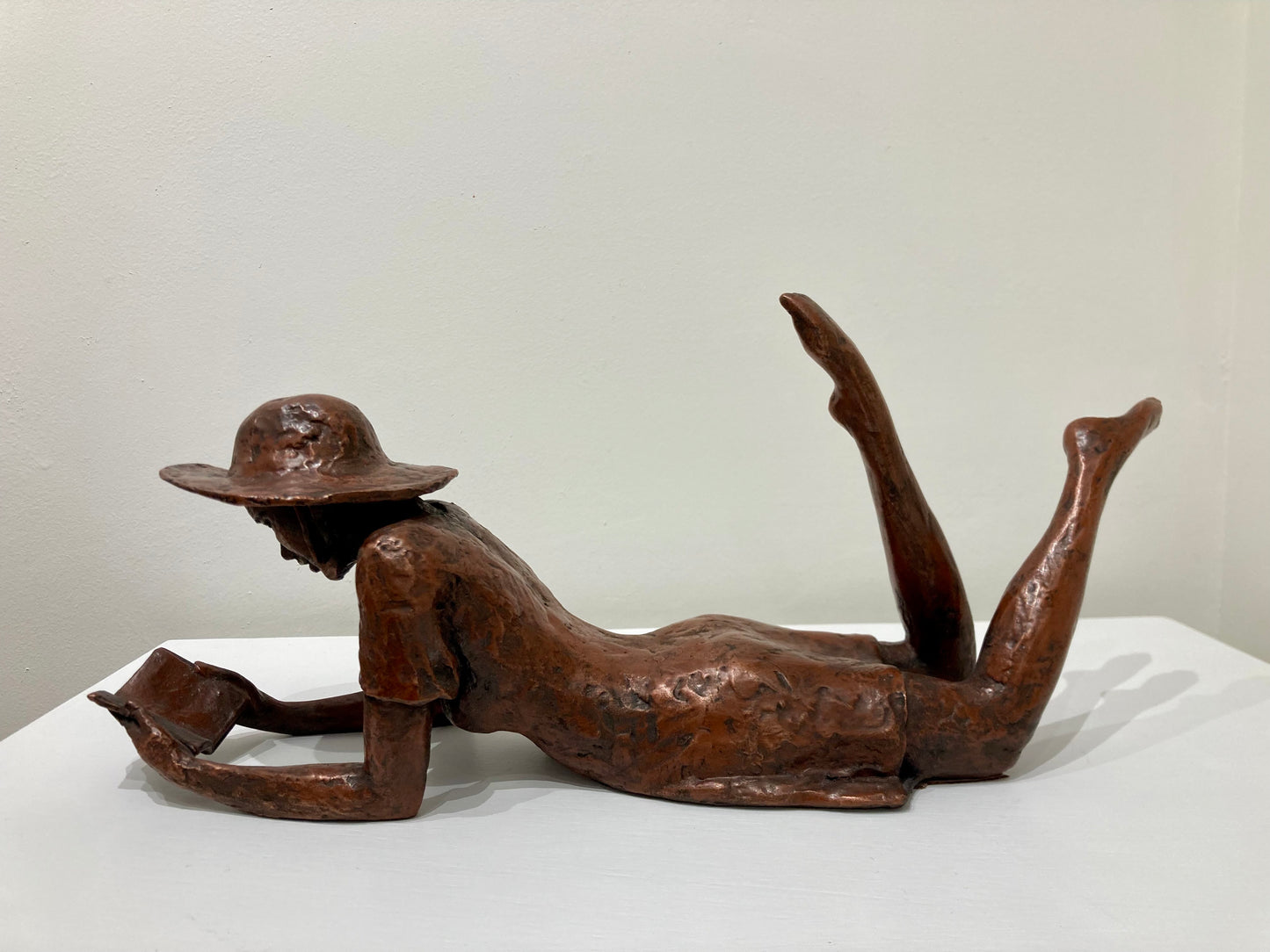 Reading Girl in a Hat - copper finish