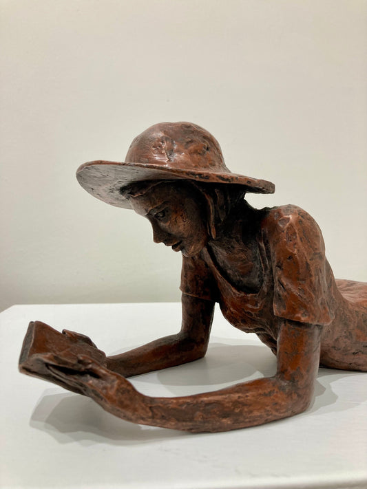 Reading Girl in a Hat - copper finish