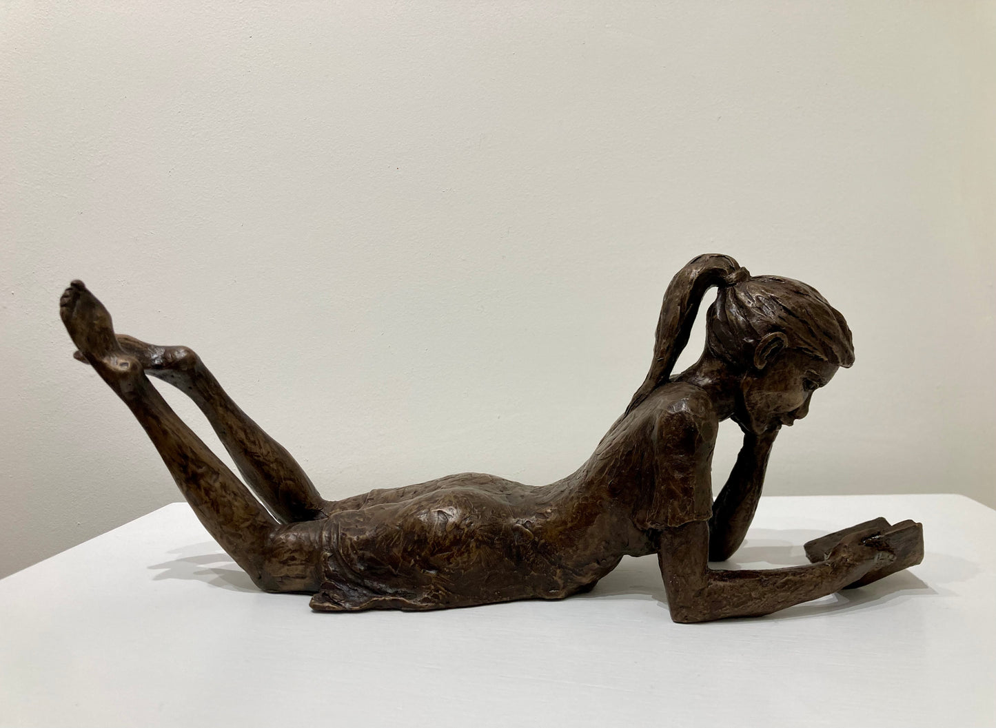 Reading Girl with a ponytail - bronze