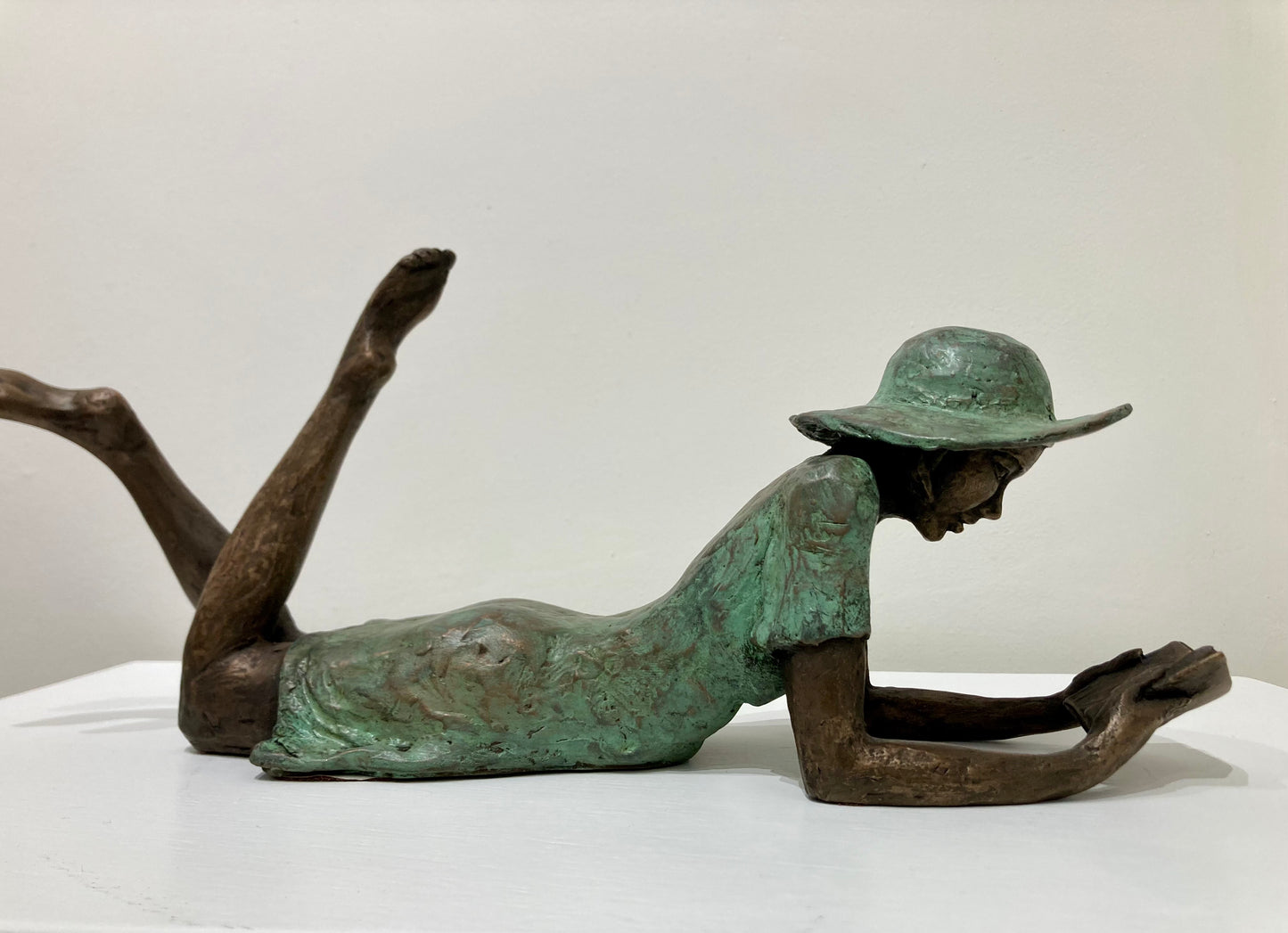 Reading Girl in a Hat - bronze and verdigris